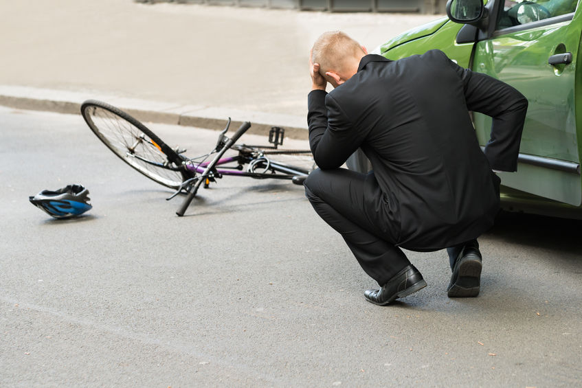 40394400 - sad male driver after collision with bicycle on road